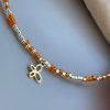 Necklace with orange, gold beads and butterfly-Golden Butterfly-mk-jewels