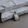 Κολιέ από ανοξείδωτο ατσάλι με μενταγιόν ορθογώνιο με Φίλντισι-Nancy Silver-mk-jewels