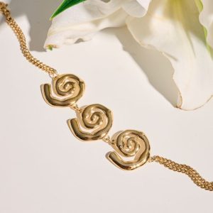 Gold plated steel bracelet with spirals- Sonia Gold- mk jewels